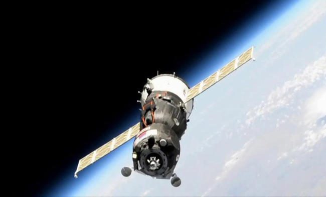 Russian spacecraft with humanoid robot docks at ISS